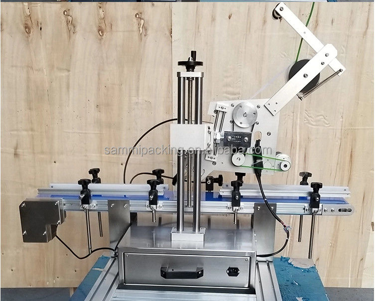 Applicateur automatique de boîtes de vitesses à surface plate