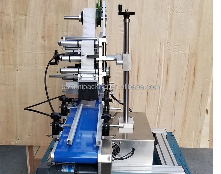 Applicateur automatique de boîtes de vitesses à surface plate