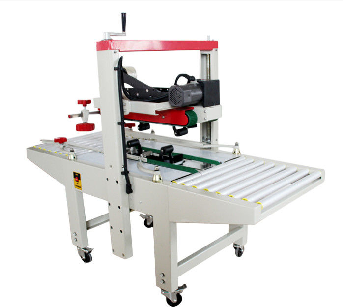 Fxj-6050 bande réglable à grande vitesse en haut en bas électrique stable boîtes de carton automatiques boîtes de carton scellant machine d'étanchéité de carton