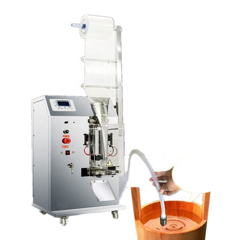 Machine de remplissage de liquide verticale semi-automatique de 100 ml pour le remplissage d'eau et de lait