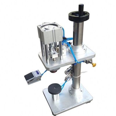 Machine pneumatique automatique pour le décapage des bouteilles de parfums