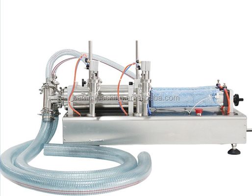 Machine de remplissage de liquide à double tête pneumatique avec une précision de remplissage de 1%